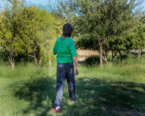 Person running in a bright outdoor environment in Monterrey